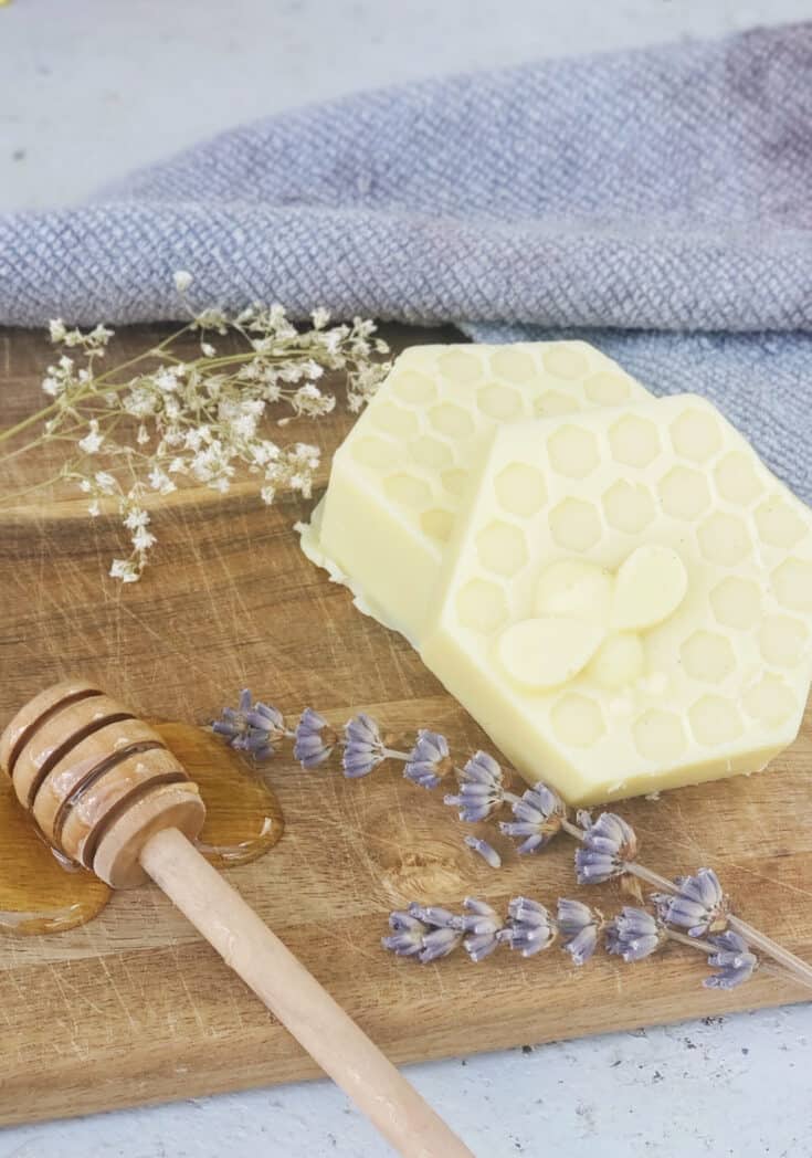 DIY Lotion bars, lavender, and honey on a wood board