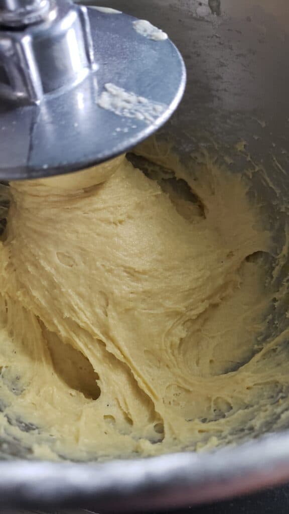 dough sticking to the sides of the mixing bowl