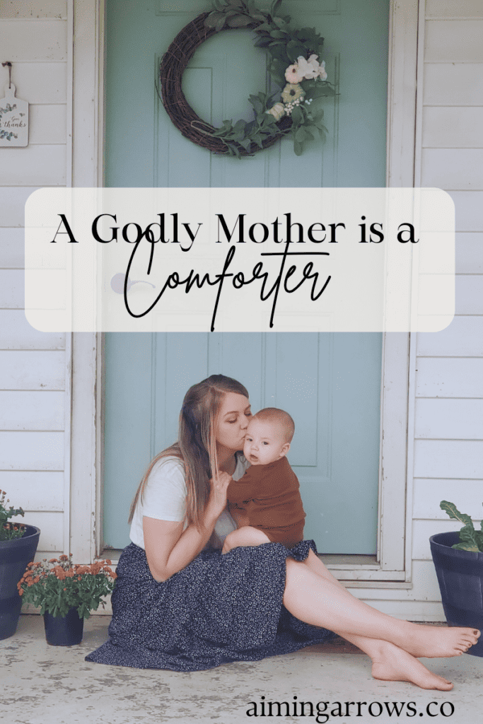a mother kissing her son on the front porch, a mother comforting her son, a godly mother is a comforter